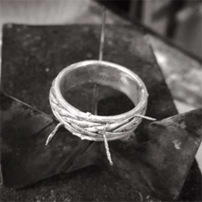 Repair work in progress - three binding wires around the ring